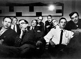 Disney's Nine Old Men - copyright Walt Disney Company. Early 1950s. Left to Right: Ward Kimball, Eric Larson, Frank Thomas, Marc Davis, Ollie Johnston, Les Clark, Milt Kahl, John Lounsbery and Wolfgang 